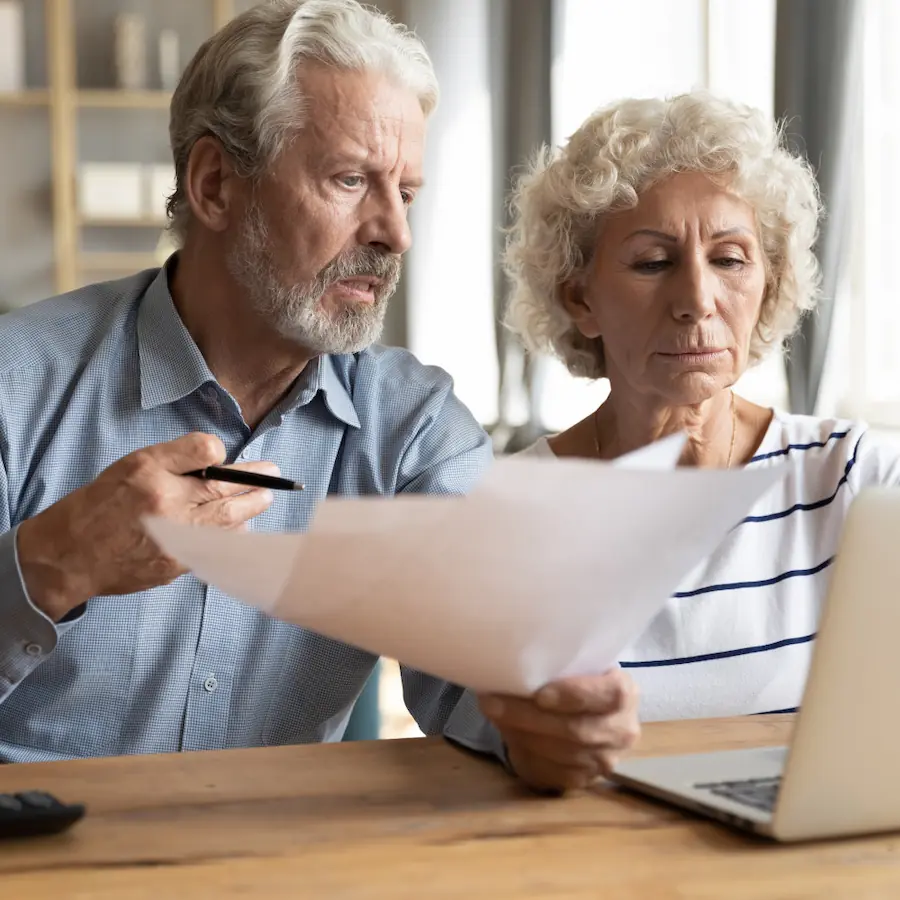 Couple looking over options on solar contract